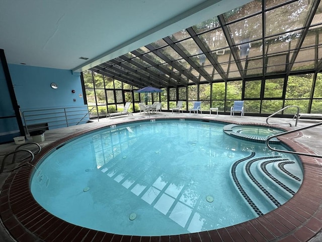 1 Loring Ave Unit 206, Swampscott, MA 01907 - view of swimming pool with a pool with connected hot tub, a lanai, and a patio area