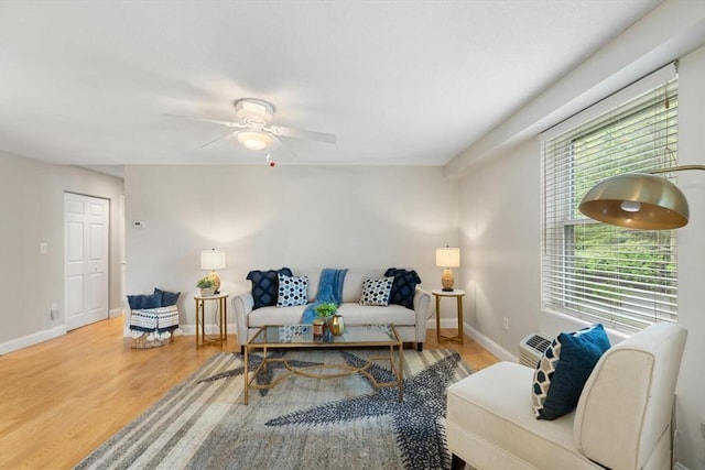 1 Loring Ave Unit 206, Swampscott, MA 01907 - living area with wood finished floors, ceiling fan, and baseboards