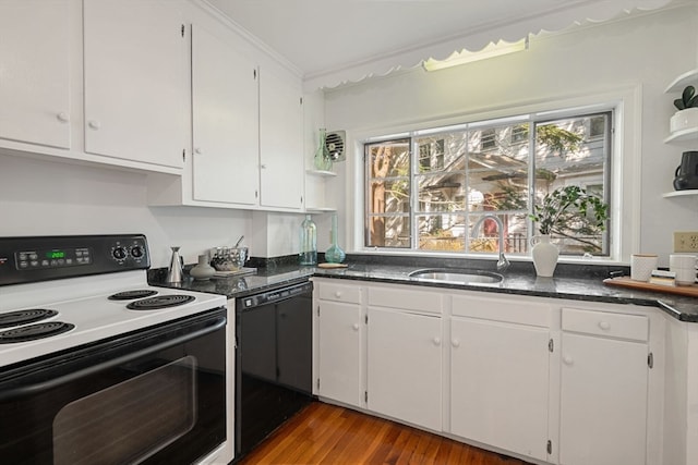 kitchen featuring dishwasher, sink, white electric range oven, hardwood / wood-style flooring, and white cabinets