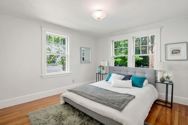 bedroom featuring dark wood-type flooring