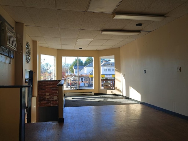 248 S Main St, Attleboro, MA 02703 - empty room featuring a paneled ceiling and baseboards