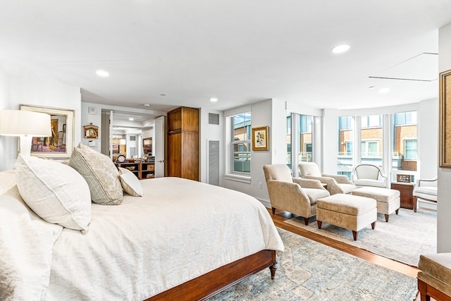 bedroom featuring wood-type flooring