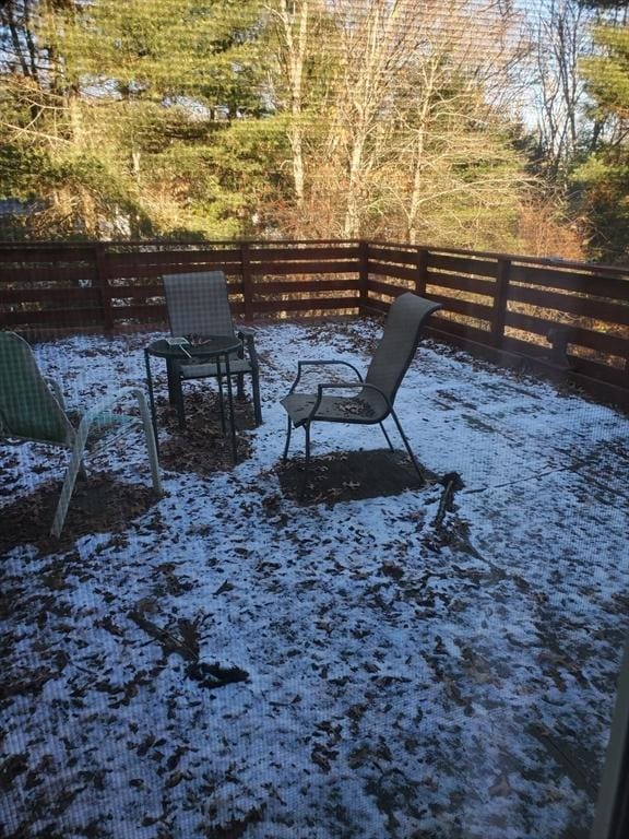 view of yard covered in snow