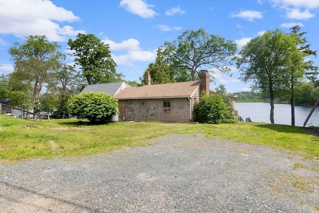 52 Lake Shore Dr, Essex, MA 01929 - view of home's exterior featuring a water view and a chimney