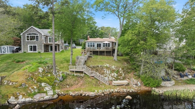 52 Lake Shore Dr, Essex, MA 01929 - rear view of property featuring a deck with water view, stairs, and a yard