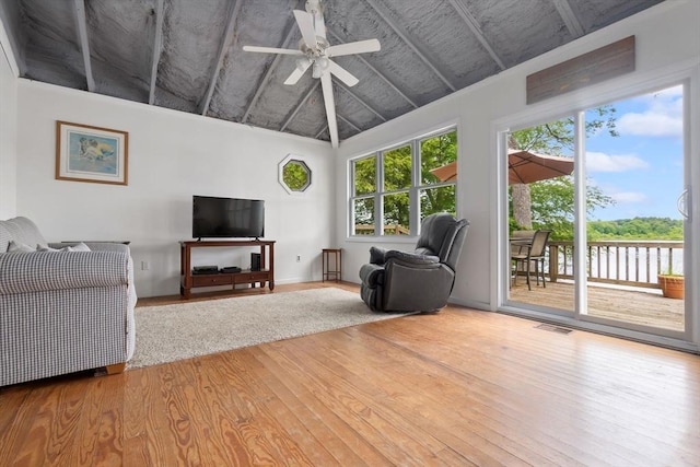 52 Lake Shore Dr, Essex, MA 01929 - living room featuring wood finished floors, ceiling fan, and high vaulted ceiling