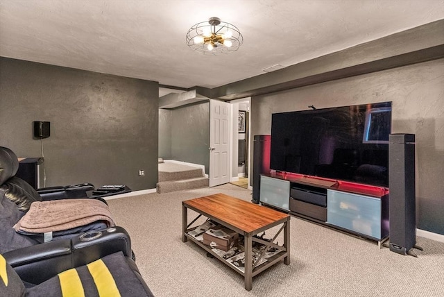 carpeted living area with stairs and baseboards