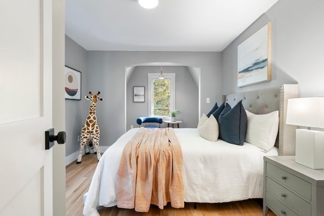 bedroom with light wood-type flooring