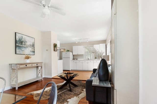 1 Batchelder Ave, North Reading, MA 01864 - living room featuring dark wood-type flooring, baseboards, and ceiling fan
