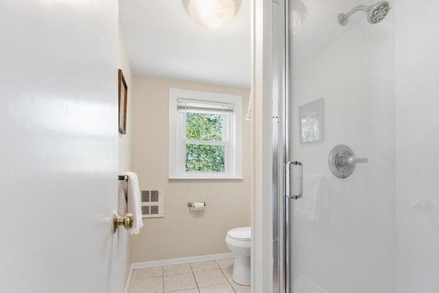 1 Batchelder Ave, North Reading, MA 01864 - bathroom with a shower stall, toilet, baseboards, and tile patterned floors