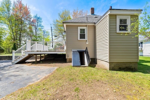 1 Batchelder Ave, North Reading, MA 01864 - back of house featuring a deck and a yard
