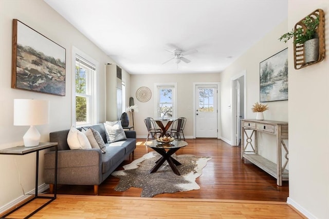 1 Batchelder Ave, North Reading, MA 01864 - living area featuring wood finished floors, ceiling fan, and baseboards