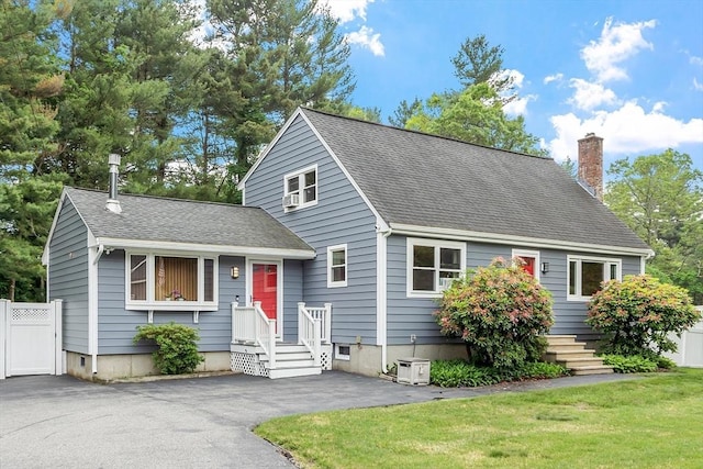 81 Baldwin Rd, Billerica, MA 01821 - new england style home featuring a chimney and a shingled roof