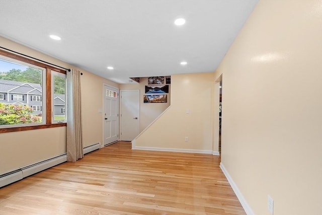 81 Baldwin Rd, Billerica, MA 01821 - foyer entrance featuring light wood finished floors, recessed lighting, and a baseboard heating unit