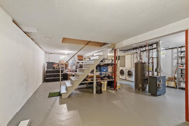 81 Baldwin Rd, Billerica, MA 01821 - below grade area featuring separate washer and dryer, water heater, stairway, a textured ceiling, and a heating unit