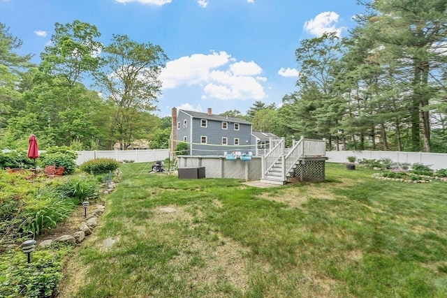 81 Baldwin Rd, Billerica, MA 01821 - fenced backyard with stairway and a deck