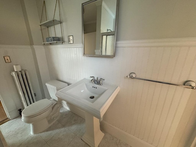 bathroom with tile patterned floors and toilet