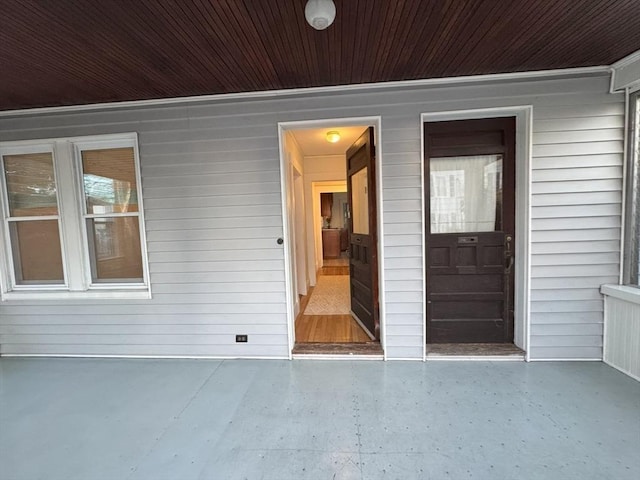 doorway to property featuring a patio