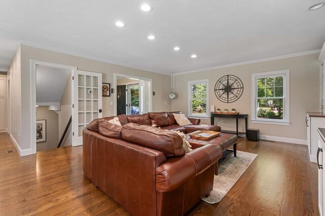 4 Kestrel Way, Carver, MA 02330 - living room with crown molding, recessed lighting, light wood-style flooring, and baseboards
