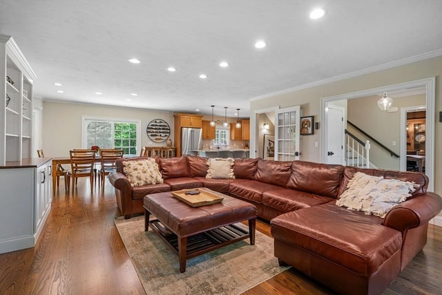 4 Kestrel Way, Carver, MA 02330 - living area with ornamental molding, recessed lighting, wood finished floors, and stairway