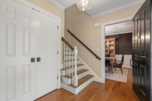 4 Kestrel Way, Carver, MA 02330 - foyer featuring dark wood finished floors, stairway, and ornamental molding