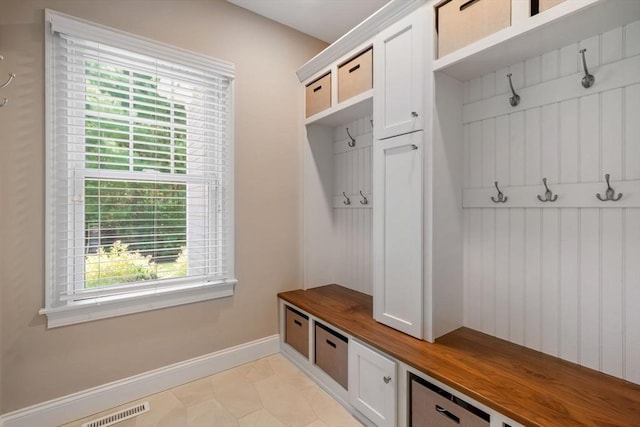 4 Kestrel Way, Carver, MA 02330 - mudroom featuring baseboards