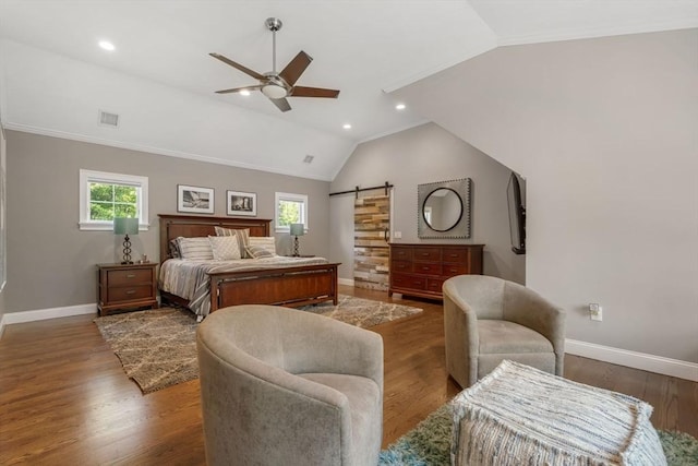 4 Kestrel Way, Carver, MA 02330 - bedroom featuring a barn door, baseboards, lofted ceiling, wood finished floors, and recessed lighting