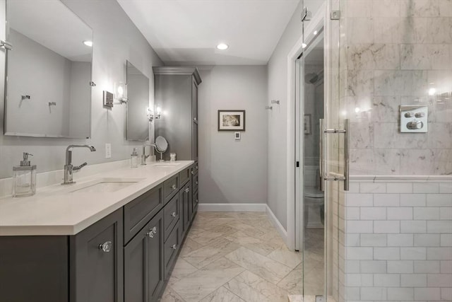 4 Kestrel Way, Carver, MA 02330 - bathroom featuring double vanity, marble finish floors, a shower stall, recessed lighting, and baseboards