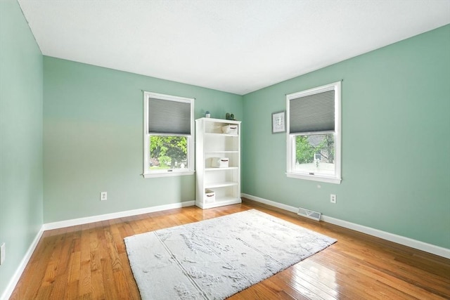 19 Arnold Ave, Chicopee, MA 01013 - unfurnished bedroom with wood-type flooring and baseboards