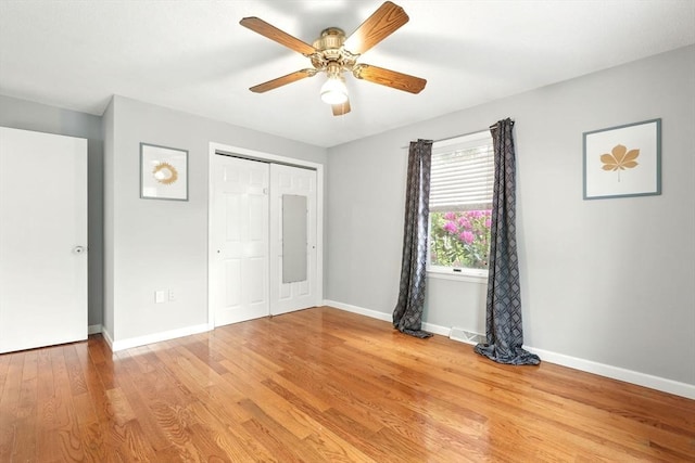 19 Arnold Ave, Chicopee, MA 01013 - unfurnished bedroom featuring light wood finished floors, a closet, baseboards, and ceiling fan