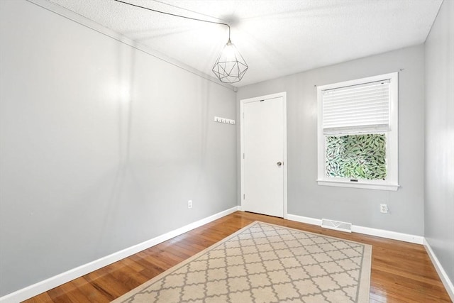 19 Arnold Ave, Chicopee, MA 01013 - empty room with wood finished floors and baseboards