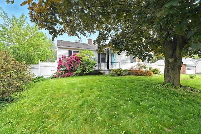 19 Arnold Ave, Chicopee, MA 01013 - view of front facade with a chimney
