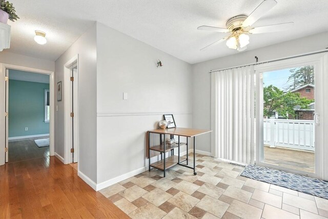 19 Arnold Ave, Chicopee, MA 01013 - dining space featuring a ceiling fan, baseboards, and a textured ceiling