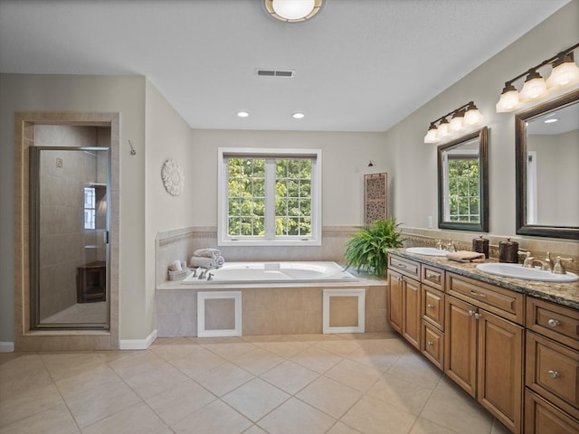 66 Saville, North Andover, MA 01845 - bathroom with double vanity, a bath, tile patterned floors, a shower stall, and recessed lighting