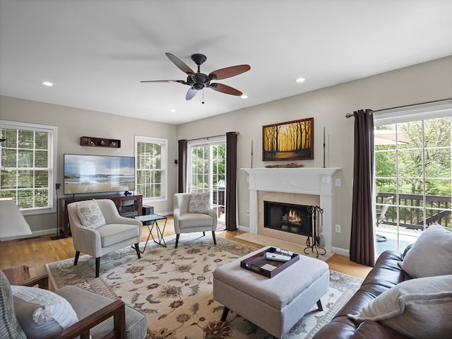 66 Saville, North Andover, MA 01845 - living area with ceiling fan, a fireplace, light wood finished floors, recessed lighting, and baseboards