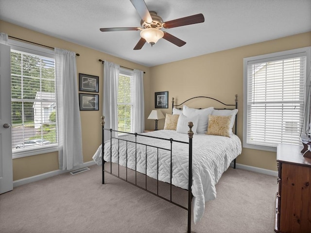 66 Saville, North Andover, MA 01845 - bedroom featuring light colored carpet, multiple windows, and baseboards