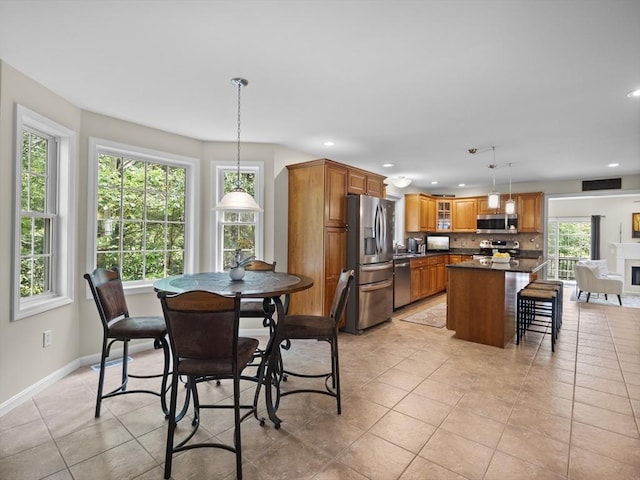 66 Saville, North Andover, MA 01845 - dining space featuring light tile patterned floors, baseboards, and recessed lighting