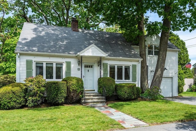 68 Shelton Rd, Swampscott, MA 01907 - new england style home with a chimney, a front lawn, an attached garage, and roof with shingles
