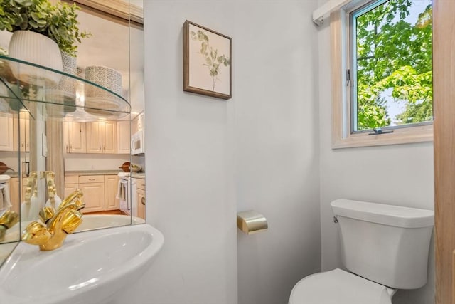 68 Shelton Rd, Swampscott, MA 01907 - half bathroom featuring toilet and a sink
