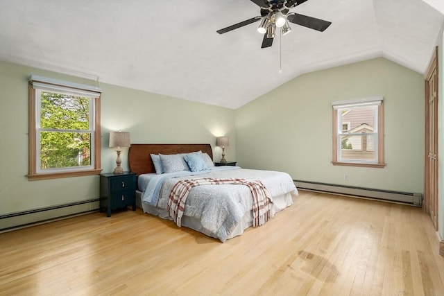 68 Shelton Rd, Swampscott, MA 01907 - bedroom with baseboard heating, light wood-type flooring, multiple windows, and lofted ceiling