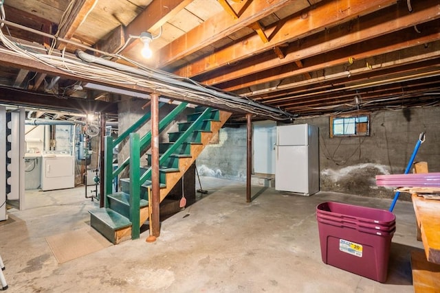 68 Shelton Rd, Swampscott, MA 01907 - below grade area with freestanding refrigerator, independent washer and dryer, and stairs