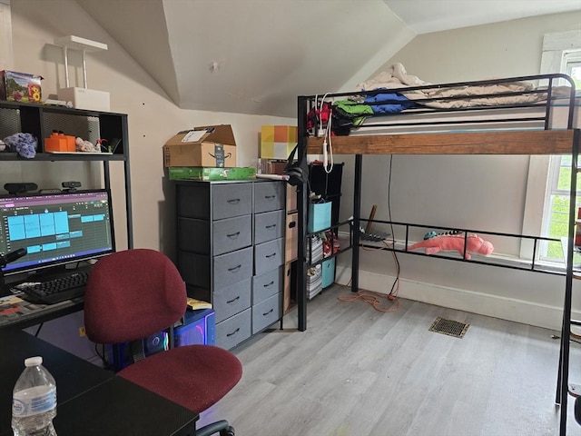 20 Central St, West Brookfield, MA 01585 - bedroom with lofted ceiling, wood finished floors, and an office area