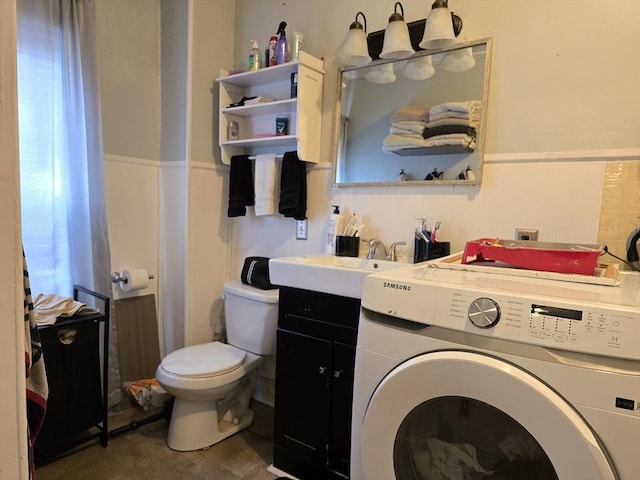 20 Central St, West Brookfield, MA 01585 - full bath with washer / dryer, a sink, toilet, and a wainscoted wall