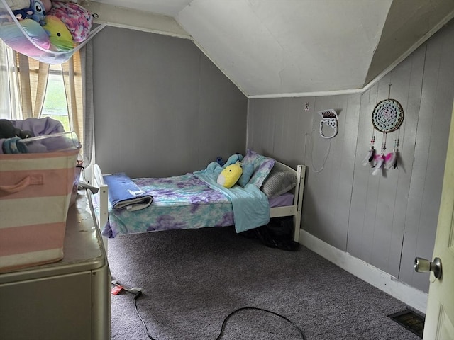 20 Central St, West Brookfield, MA 01585 - bedroom featuring vaulted ceiling, carpet flooring, wood walls, and baseboards