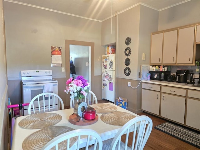 20 Central St, West Brookfield, MA 01585 - kitchen featuring white appliances, crown molding, light countertops, wood finished floors, and cream cabinets