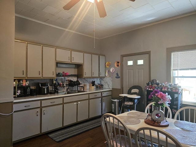 20 Central St, West Brookfield, MA 01585 - kitchen featuring light countertops, a ceiling fan, ornamental molding, decorative backsplash, and black microwave