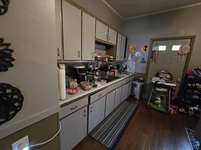 20 Central St, West Brookfield, MA 01585 - kitchen with dark wood finished floors, light countertops, white cabinets, crown molding, and a sink