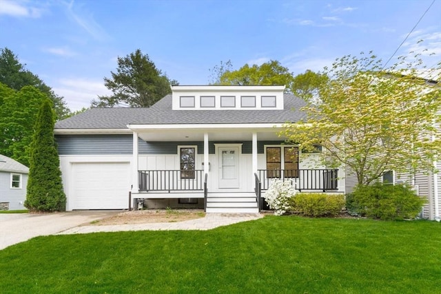 20 Dudley, Wayland, MA 01778 - view of front of property with a garage, covered porch, a front lawn, roof with shingles, and concrete driveway