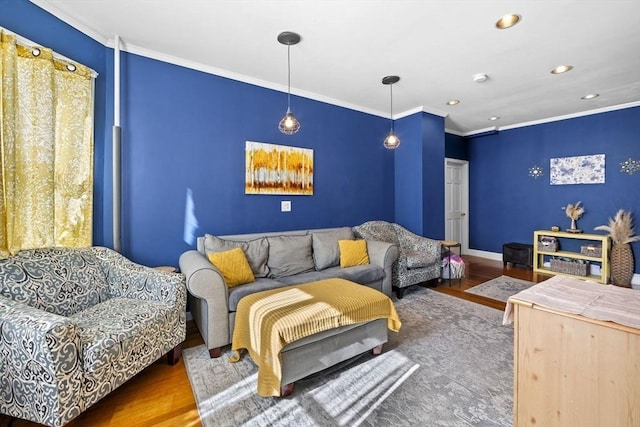 living area with recessed lighting, wood finished floors, baseboards, and ornamental molding