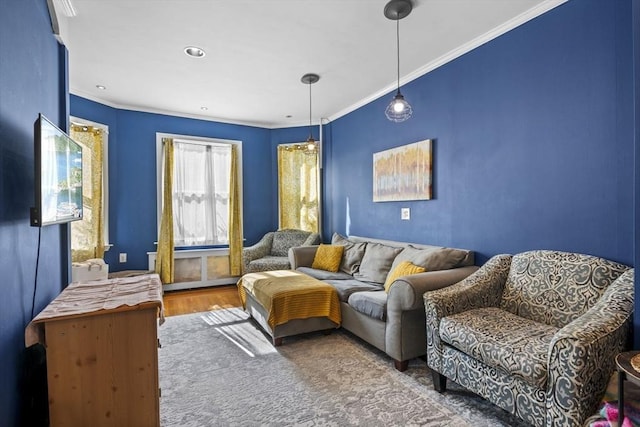 living room featuring crown molding and wood finished floors